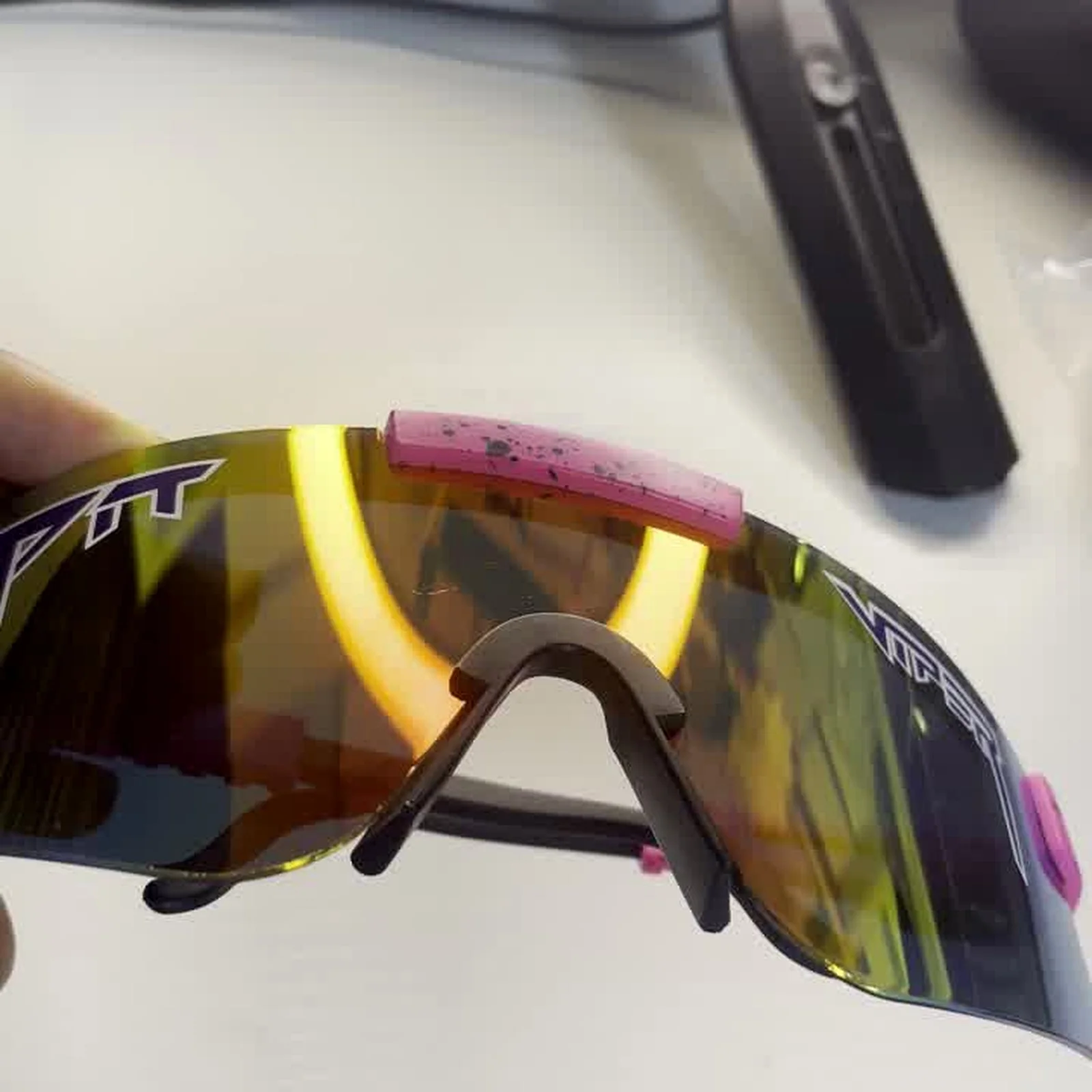 VeloVisor AeroShield Pro shield sunglasses showing large lens wrap and sporty temple arms